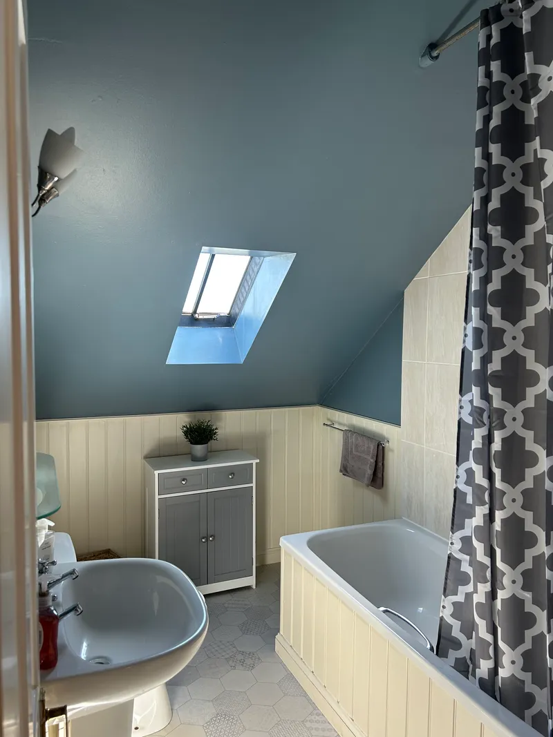 Bathroom with shower and bath