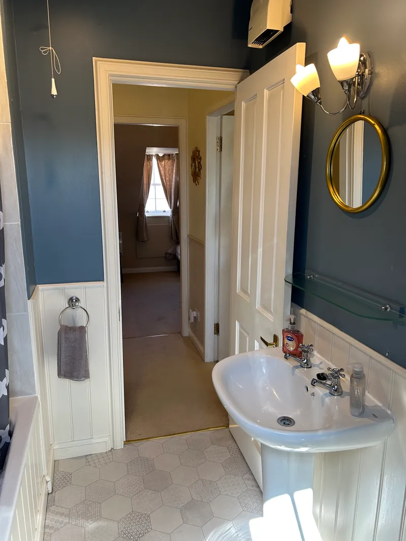 Bathroom with shower and bath