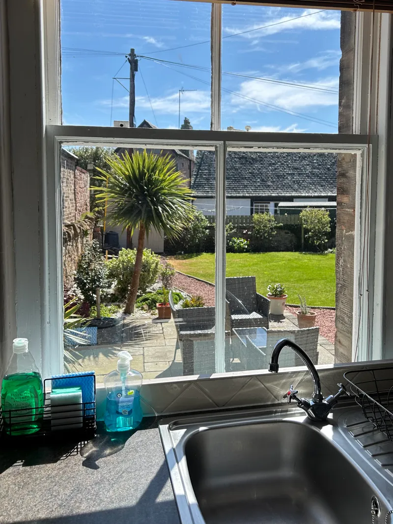 Kitchen with dining table and four chairs