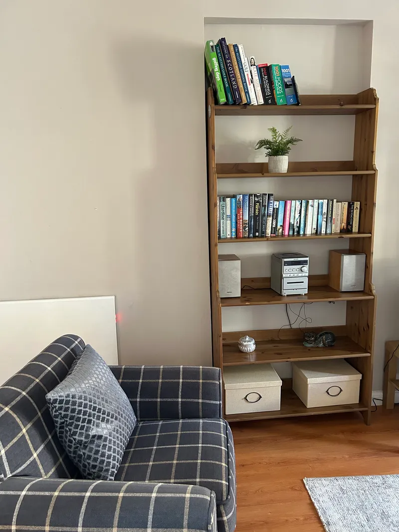 Living room with sofa seating and smart TV
